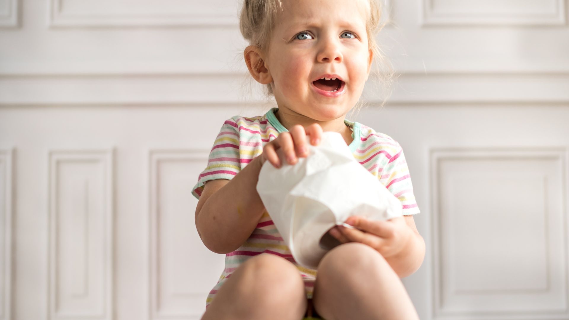 Waarom weigert mijn kind op het potje te poepen?